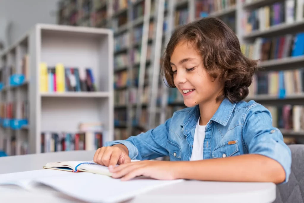 little-boy-doing-his-homework-library