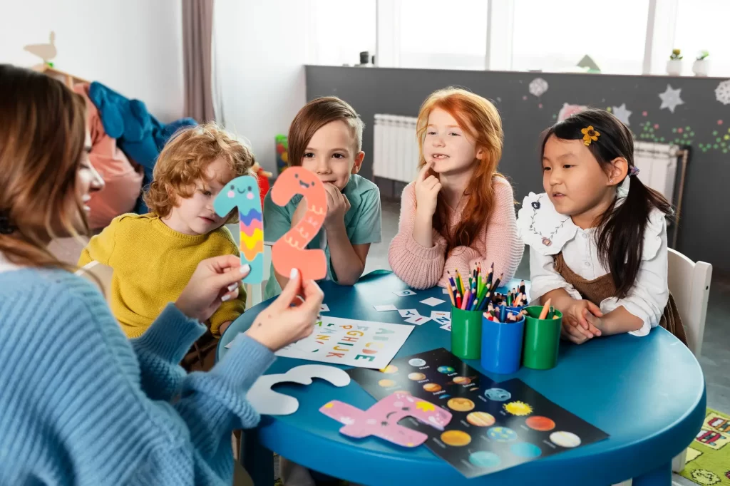 medium-shot-kids-sitting-together-table